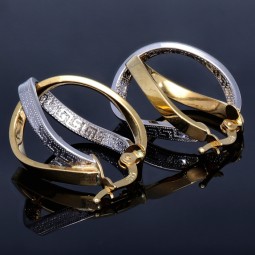 Wunderschöne geschwungene  Designer - Creolen in Bicolor 585er (14K) Weiß- und Gelbgold