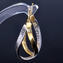 Wunderschöne geschwungene  Designer - Creolen in Bicolor 585er (14K) Weiß- und Gelbgold