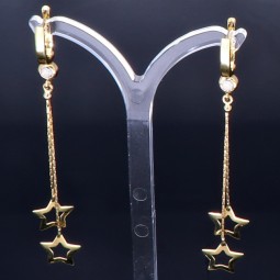 bezaubernde, hängende Sternchen - Ohrringe mit eingefasstem Zirkonia in 585er (14K) Gelbgold