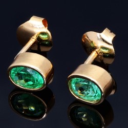 Funkelnde, moderne Ohrstecker mit 2 ovalen, leuchtend hellgrünen kolumbianischen Smaragden