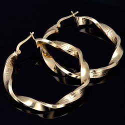 Exquisite Twist - Creolen mit filgranem Greco - Design aus 585er (14K) Gelbgold