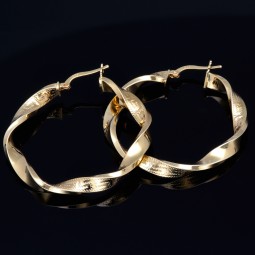 Exquisite Twist - Creolen mit filgranem Greco - Design aus 585er (14K) Gelbgold