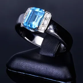 Ring für Damen in 750 18 Karat Weißgold mit 6 Brillanten und einem intensiv türkisen, großen Topas - Stein handgefertigt in Ringgröße 58